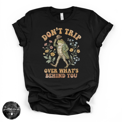 Don’t Trip Over What’s Behind You Tee | Inspirational Graphic T-Shirt